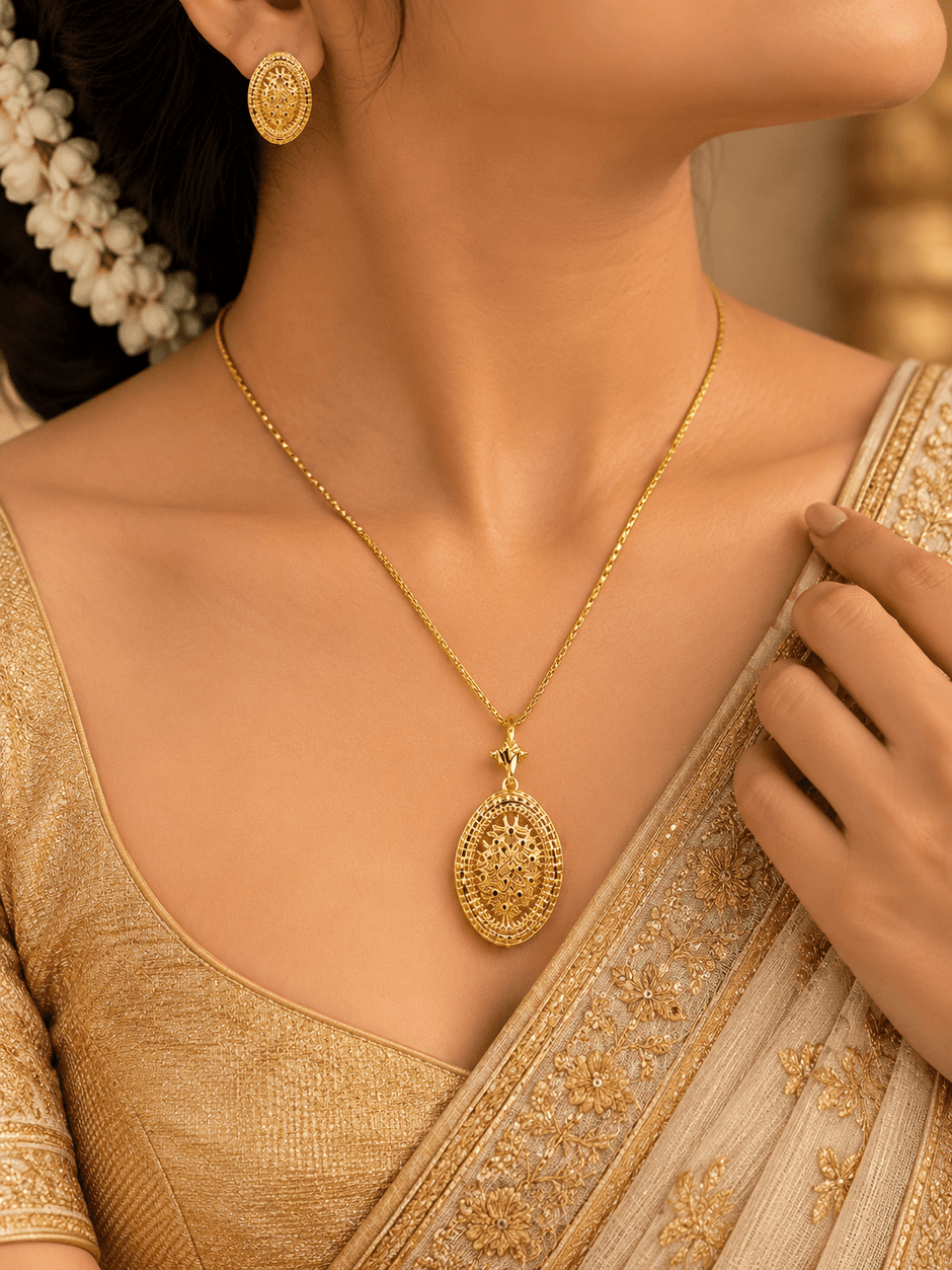 Bhavmayi gold-tone oval necklace and matching earrings with intricate floral and geometric medallion detailing - bhavmayi