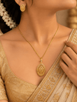 Bhavmayi gold-tone oval necklace and matching earrings with intricate floral and geometric medallion detailing - bhavmayi
