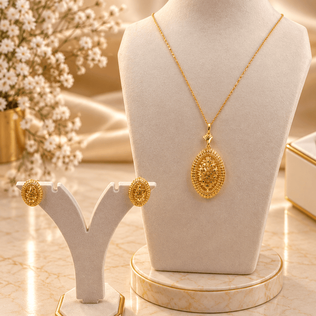 Bhavmayi gold-tone oval necklace and matching earrings with intricate floral and geometric medallion detailing - bhavmayi