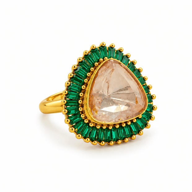 Bhavmayi gold-tone statement ring with green rectangular stones surrounding a large rounded triangular centre - bhavmayi