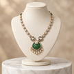 Bhavmayi gold-tone teardrop necklace and matching earrings shown with pink and green centre accent variations - bhavmayi
