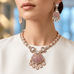 Bhavmayi gold-tone teardrop necklace and matching earrings shown with pink and green centre accent variations - bhavmayi