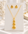 Bhavmayi Golden Floral Teardrop Necklace & Earrings Set - bhavmayi