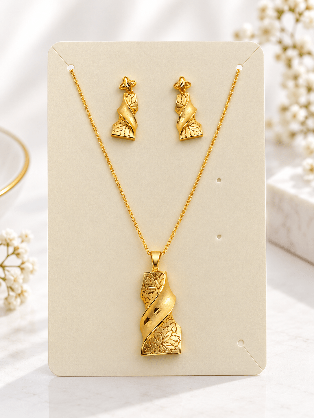 Bhavmayi Golden Leaf Twist Pendant Necklace & Earrings Set - bhavmayi