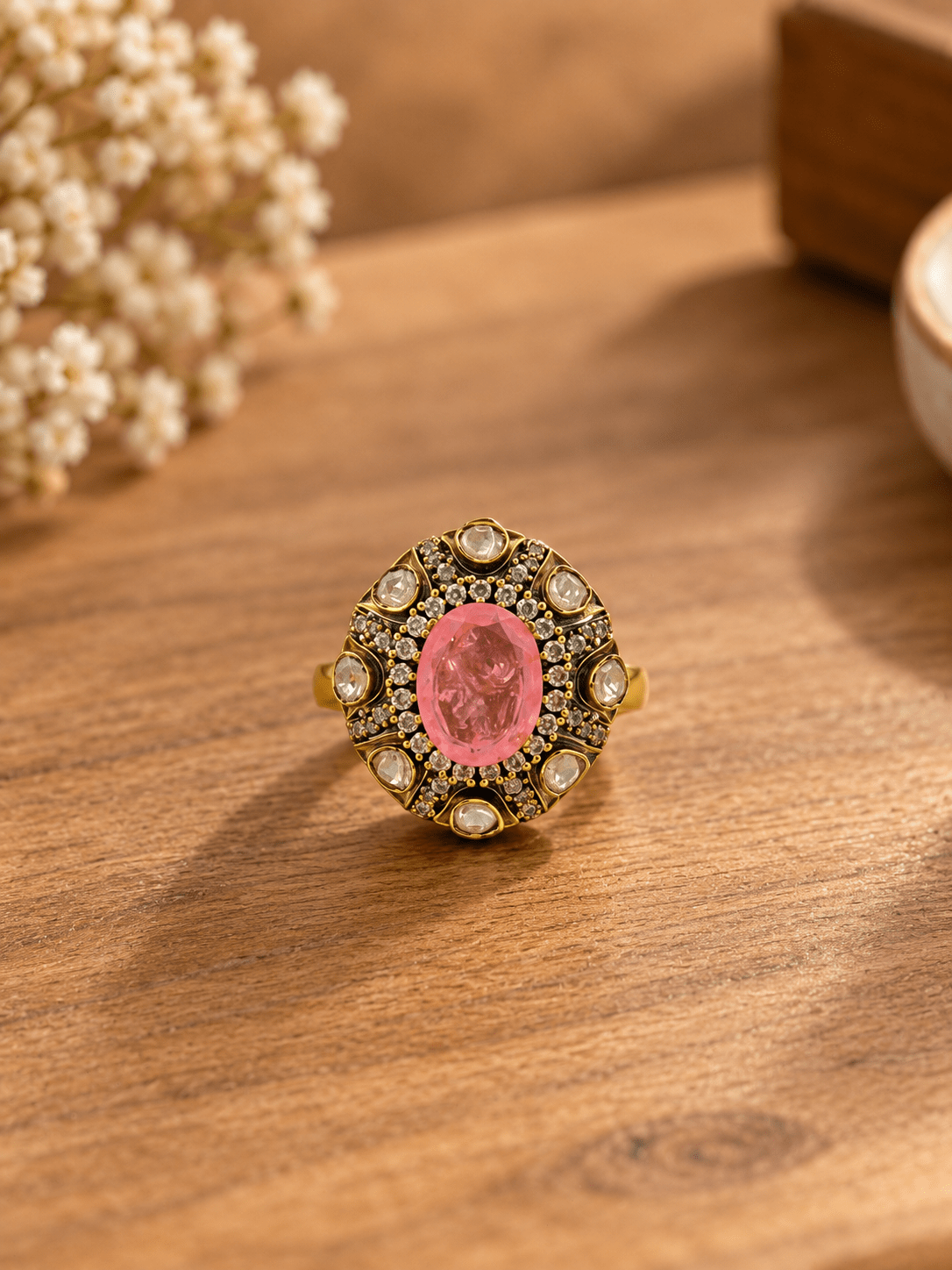 Bhavmayi pink oval crystal statement ring with clear stones and ornate gold-tone detailing - bhavmayi