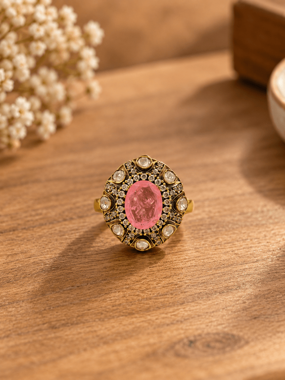 Bhavmayi pink oval crystal statement ring with clear stones and ornate gold-tone detailing - bhavmayi