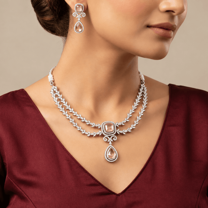 Bhavmayi rose gold-tone layered necklace set with pink square and teardrop accents and matching earrings - bhavmayi