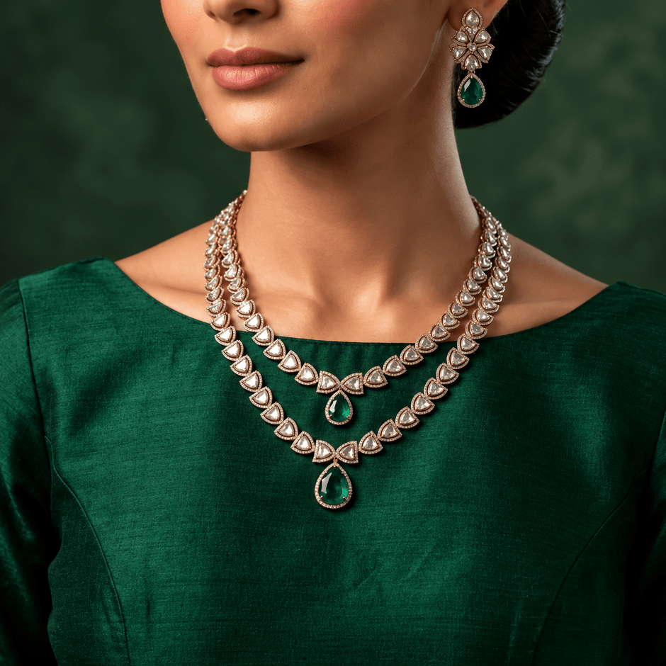 Bhavmayi rose gold-tone layered necklace with triangular clear accents and two green faceted teardrop pendants - bhavmayi
