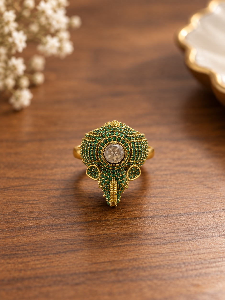 Bhavmayi green beaded statement ring with round clear centre and intricate gold-tone detailing