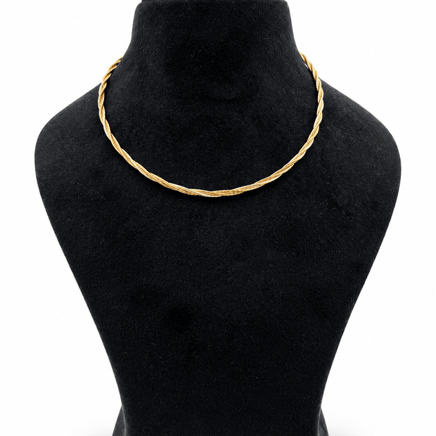 Two-tone twisted chain necklace featuring intertwined golden and silver-toned strands