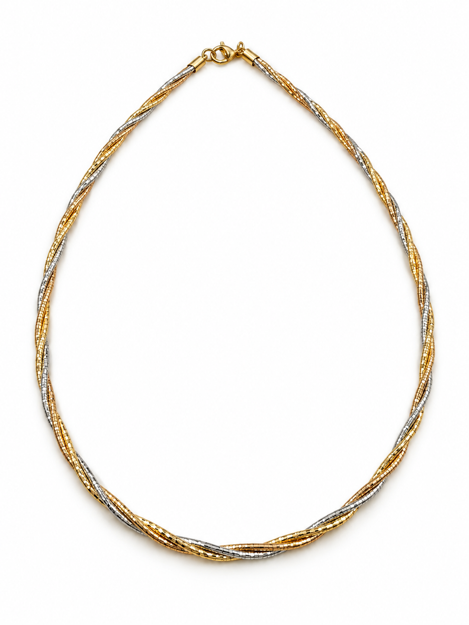 Delicate gold and silver-tone multi-strand chain necklace with an intertwined twisted-link pattern and clasp closure, displayed on a black necklace stand.