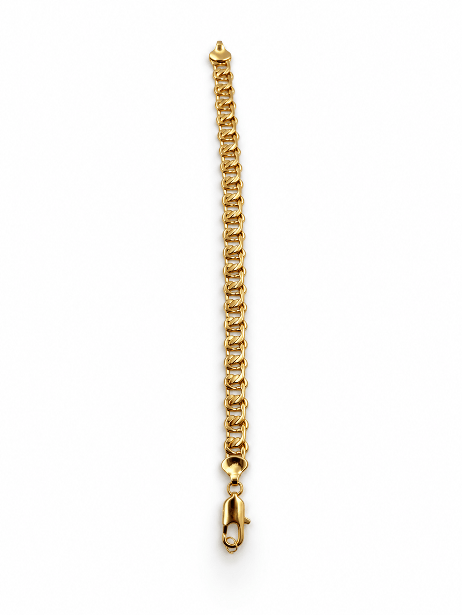 Gold-tone bracelet featuring a continuous chain of rounded interlocking links with a twisted appearance, shown separately and worn around a woman's wrist. - bhavmayi