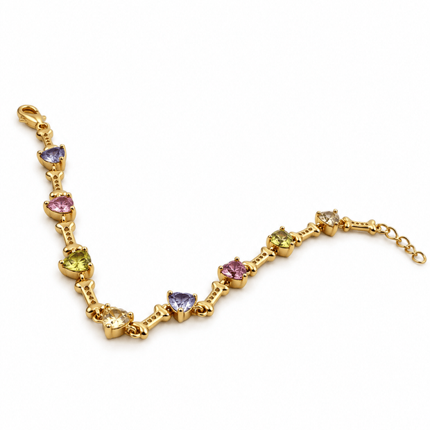 Gold-tone chain bracelet featuring geometric golden links and multicoloured blue, purple, pink, green and clear decorative accents, shown separately and worn on a wrist. - bhavmayi