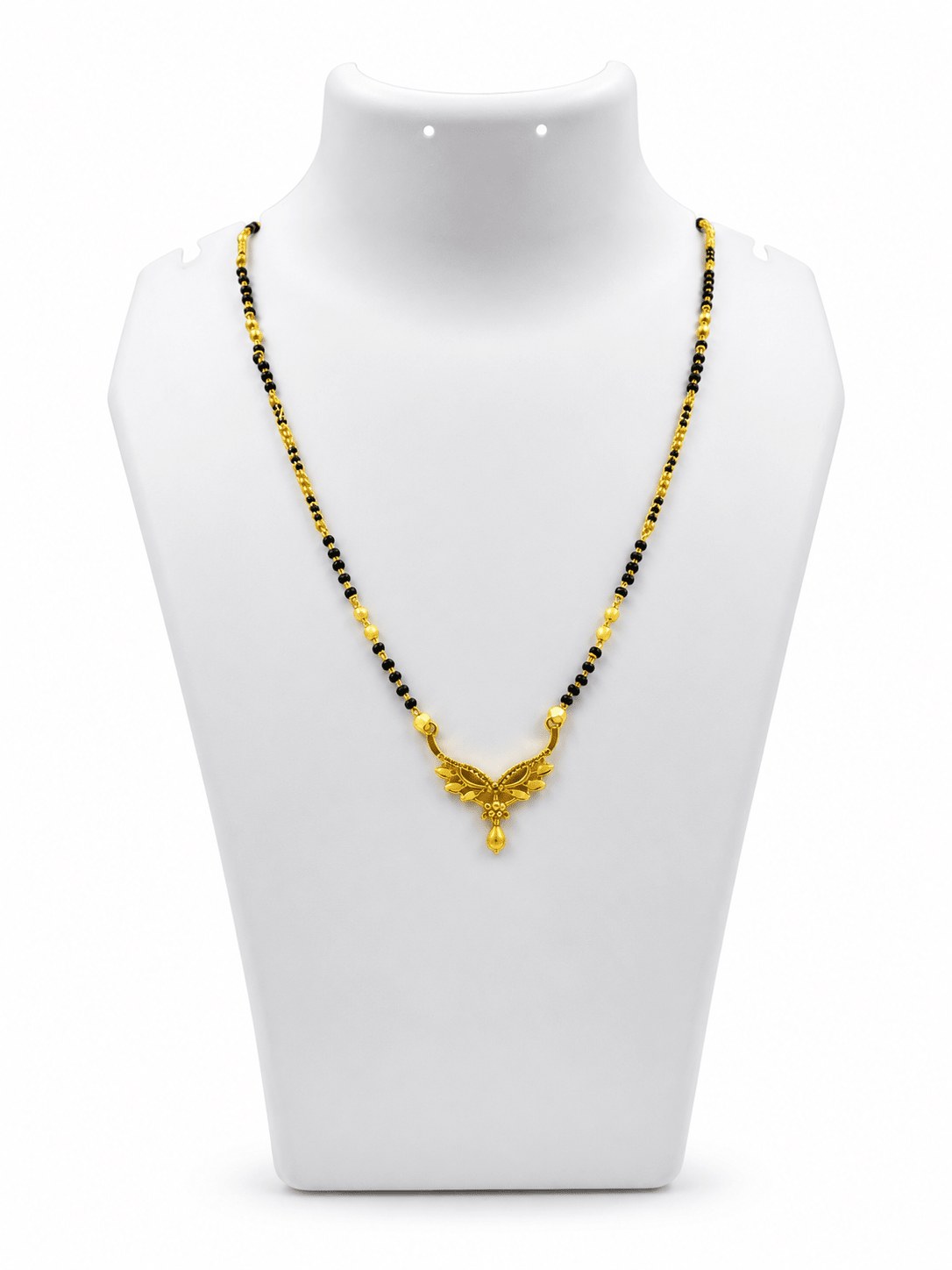Gold-tone mangalsutra necklace with black bead chain, symmetrical leaf-shaped centerpiece, clear stone embellishments and a decorative central drop detail, displayed on a white background. - bhavmayi