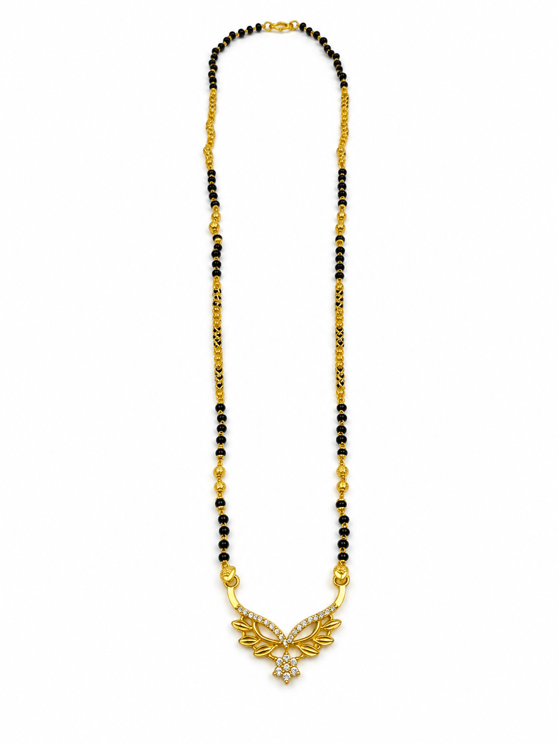 Gold-tone mangalsutra necklace with black bead chain, symmetrical leaf-shaped centerpiece, clear stone embellishments and a decorative central drop detail, displayed on a white background. - bhavmayi