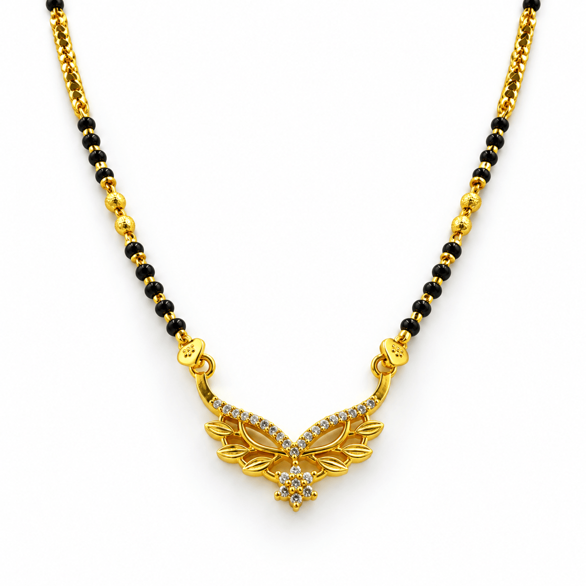 Gold-tone mangalsutra necklace with black bead chain, symmetrical leaf-shaped centerpiece, clear stone embellishments and a decorative central drop detail, displayed on a white background. - bhavmayi