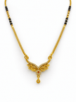 Gold-tone mangalsutra necklace with black beads, symmetrical floral leaf-shaped centerpiece, clear decorative stones, red center accent, and dangling teardrop pendant on a white background. - bhavmayi