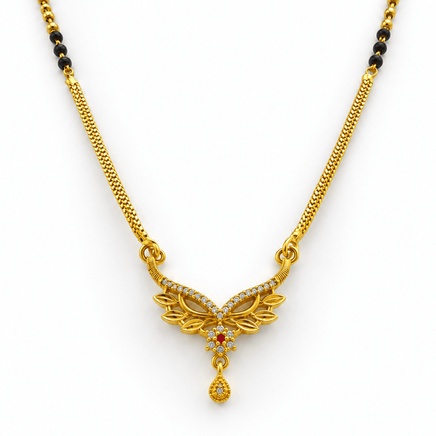 Bhavmayi gold-tone mangalsutra necklace featuring black beads, a floral pendant with white stone-like accents.
