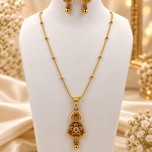 Bhavmayi golden-toned teardrop pendant necklace and matching earrings with green and pink-red accent details