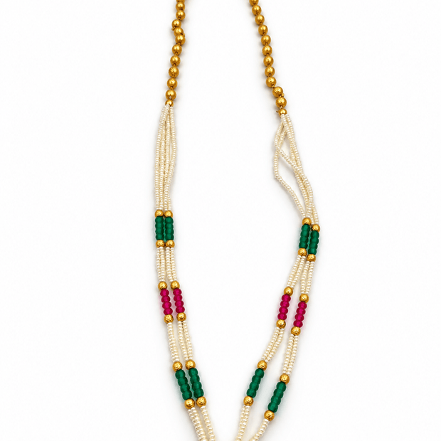 Long multistrand ivory-white pearl-style necklace featuring round gold-tone beads, green and magenta bead sections,- bhavmayi