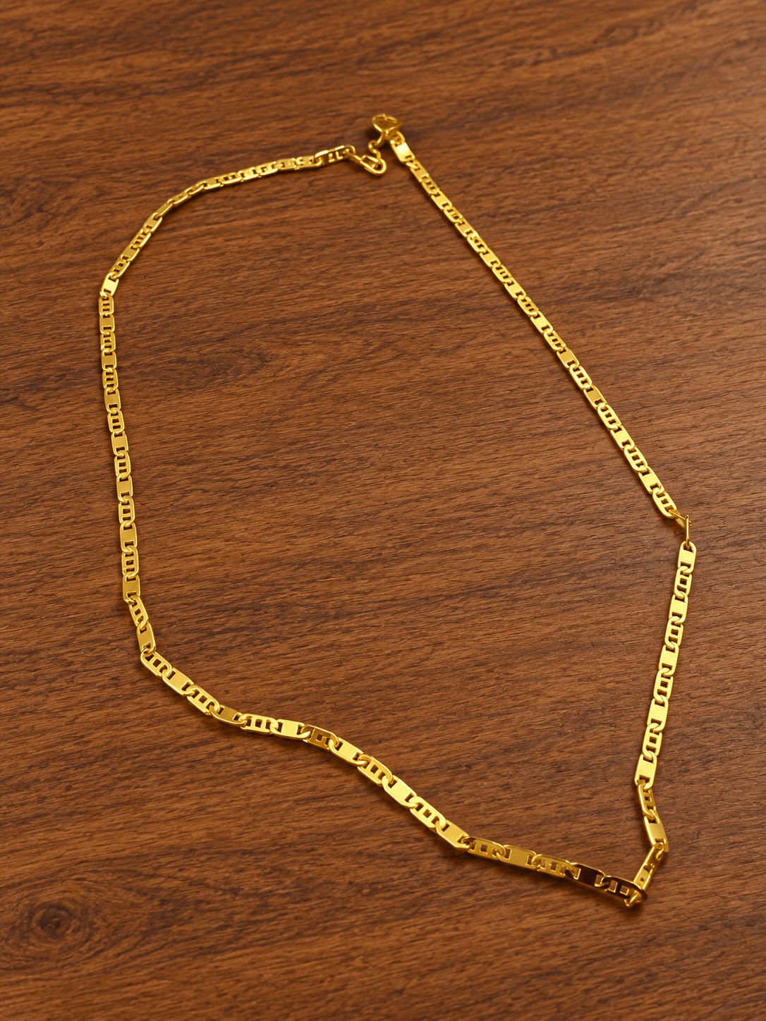 Men's gold chain with repeating geometric link design - bhavmayi